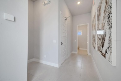Discover luxury living in this upgraded, fully furnished modern on Reunion Resort Golf Course in Florida - for sale on GolfHomes.com, golf home, golf lot