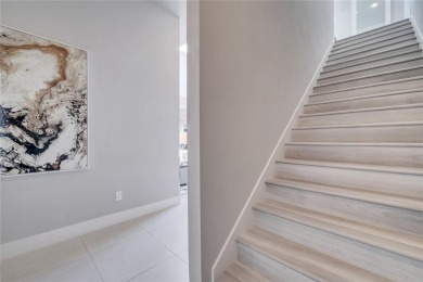 Discover luxury living in this upgraded, fully furnished modern on Reunion Resort Golf Course in Florida - for sale on GolfHomes.com, golf home, golf lot