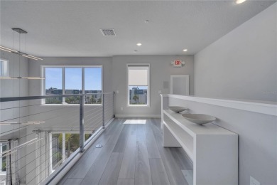 Discover luxury living in this upgraded, fully furnished modern on Reunion Resort Golf Course in Florida - for sale on GolfHomes.com, golf home, golf lot