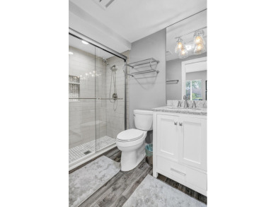 Experience luxury living on the 8th hole of the Match Course in on PGA National Golf Club in Florida - for sale on GolfHomes.com, golf home, golf lot