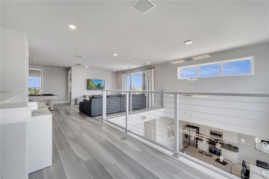 Discover luxury living in this upgraded, fully furnished modern on Reunion Resort Golf Course in Florida - for sale on GolfHomes.com, golf home, golf lot