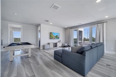 Discover luxury living in this upgraded, fully furnished modern on Reunion Resort Golf Course in Florida - for sale on GolfHomes.com, golf home, golf lot