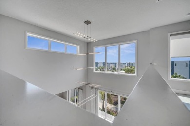 Discover luxury living in this upgraded, fully furnished modern on Reunion Resort Golf Course in Florida - for sale on GolfHomes.com, golf home, golf lot