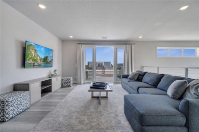 Discover luxury living in this upgraded, fully furnished modern on Reunion Resort Golf Course in Florida - for sale on GolfHomes.com, golf home, golf lot