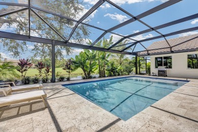 Experience luxury living on the 8th hole of the Match Course in on PGA National Golf Club in Florida - for sale on GolfHomes.com, golf home, golf lot