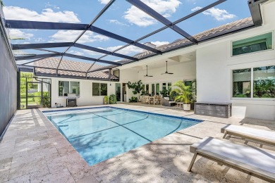 Experience luxury living on the 8th hole of the Match Course in on PGA National Golf Club in Florida - for sale on GolfHomes.com, golf home, golf lot