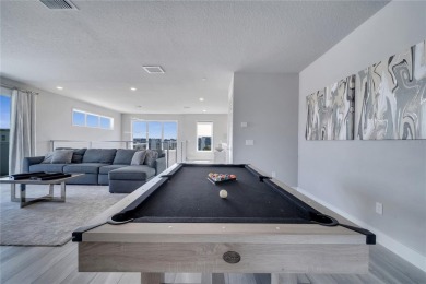 Discover luxury living in this upgraded, fully furnished modern on Reunion Resort Golf Course in Florida - for sale on GolfHomes.com, golf home, golf lot