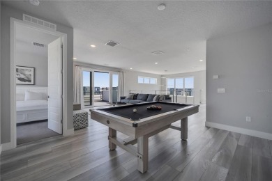 Discover luxury living in this upgraded, fully furnished modern on Reunion Resort Golf Course in Florida - for sale on GolfHomes.com, golf home, golf lot