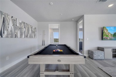 Discover luxury living in this upgraded, fully furnished modern on Reunion Resort Golf Course in Florida - for sale on GolfHomes.com, golf home, golf lot