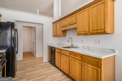 This beautifully renovated ranch-style home, located in a on Summergrove Golf Club in Georgia - for sale on GolfHomes.com, golf home, golf lot