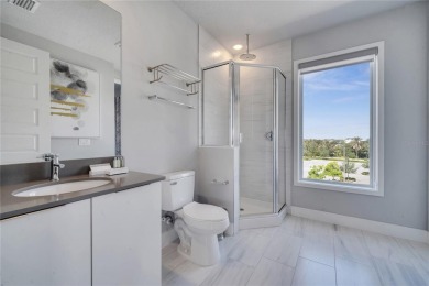 Discover luxury living in this upgraded, fully furnished modern on Reunion Resort Golf Course in Florida - for sale on GolfHomes.com, golf home, golf lot