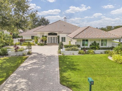 Experience luxury living on the 8th hole of the Match Course in on PGA National Golf Club in Florida - for sale on GolfHomes.com, golf home, golf lot