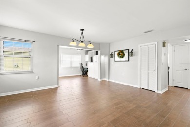 Welcome to this beautifully updated single-family pool home in on The Dunedin Country Club in Florida - for sale on GolfHomes.com, golf home, golf lot