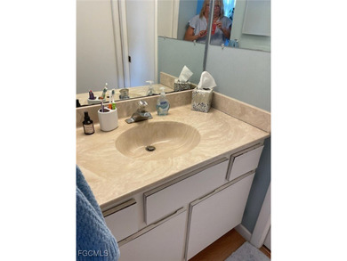 Quick move-in! Home is 2/2, lake view, steps from pool, first on Hideaway Country Club in Florida - for sale on GolfHomes.com, golf home, golf lot