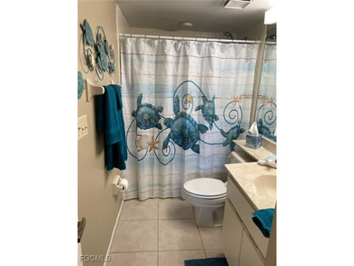 Quick move-in! Home is 2/2, lake view, steps from pool, first on Hideaway Country Club in Florida - for sale on GolfHomes.com, golf home, golf lot