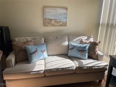 Quick move-in! Home is 2/2, lake view, steps from pool, first on Hideaway Country Club in Florida - for sale on GolfHomes.com, golf home, golf lot