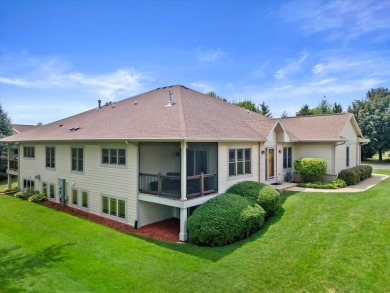 Enjoy gorgeous views in this impressive condo on the 13th hole on Meadowbrook Country Club in Wisconsin - for sale on GolfHomes.com, golf home, golf lot