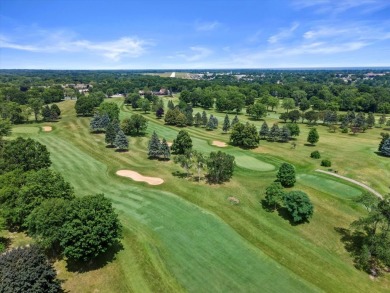 Enjoy gorgeous views in this impressive condo on the 13th hole on Meadowbrook Country Club in Wisconsin - for sale on GolfHomes.com, golf home, golf lot