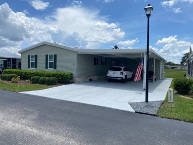 I don't where to start, but here we go!  This Palm Harbor, FULL on Southport Springs Golf Club in Florida - for sale on GolfHomes.com, golf home, golf lot
