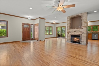 Enjoy gorgeous views in this impressive condo on the 13th hole on Meadowbrook Country Club in Wisconsin - for sale on GolfHomes.com, golf home, golf lot