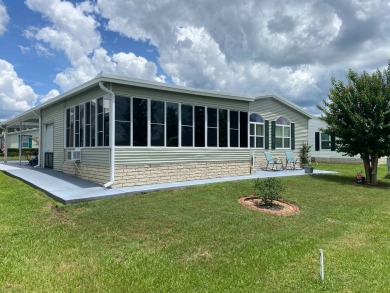 I don't where to start, but here we go!  This Palm Harbor, FULL on Southport Springs Golf Club in Florida - for sale on GolfHomes.com, golf home, golf lot