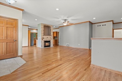 Enjoy gorgeous views in this impressive condo on the 13th hole on Meadowbrook Country Club in Wisconsin - for sale on GolfHomes.com, golf home, golf lot