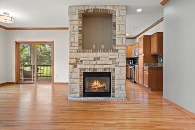 Enjoy gorgeous views in this impressive condo on the 13th hole on Meadowbrook Country Club in Wisconsin - for sale on GolfHomes.com, golf home, golf lot