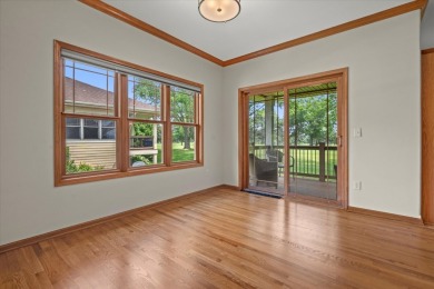 Enjoy gorgeous views in this impressive condo on the 13th hole on Meadowbrook Country Club in Wisconsin - for sale on GolfHomes.com, golf home, golf lot