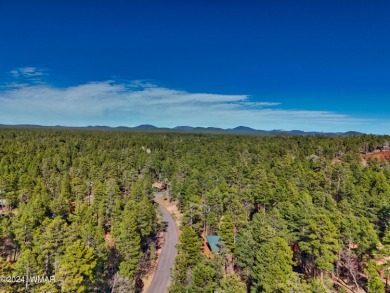 Custom FULL LOG cabin ON TWO LOTS . This Pinetop Lakes Country on Pinetop Lakes Golf and Country Club in Arizona - for sale on GolfHomes.com, golf home, golf lot