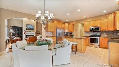 Carefree Lake Living Starts Here at Bello Point! Experience the on The Club At Porto Cima in Missouri - for sale on GolfHomes.com, golf home, golf lot