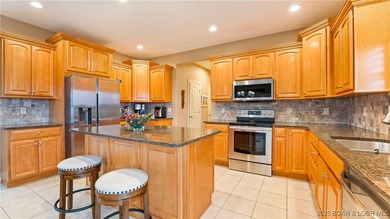 Carefree Lake Living Starts Here at Bello Point! Experience the on The Club At Porto Cima in Missouri - for sale on GolfHomes.com, golf home, golf lot