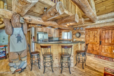 Custom FULL LOG cabin ON TWO LOTS . This Pinetop Lakes Country on Pinetop Lakes Golf and Country Club in Arizona - for sale on GolfHomes.com, golf home, golf lot