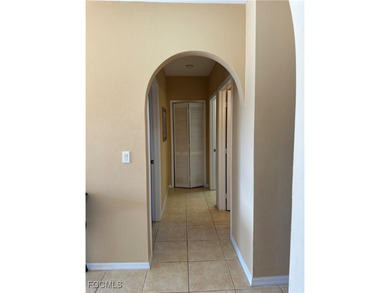 This 2nd-floor end-unit condo is shaded by mature trees and on Westminster Golf Club in Florida - for sale on GolfHomes.com, golf home, golf lot