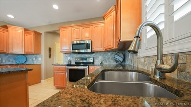 Carefree Lake Living Starts Here at Bello Point! Experience the on The Club At Porto Cima in Missouri - for sale on GolfHomes.com, golf home, golf lot