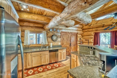 Custom FULL LOG cabin ON TWO LOTS . This Pinetop Lakes Country on Pinetop Lakes Golf and Country Club in Arizona - for sale on GolfHomes.com, golf home, golf lot