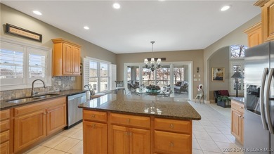 Carefree Lake Living Starts Here at Bello Point! Experience the on The Club At Porto Cima in Missouri - for sale on GolfHomes.com, golf home, golf lot