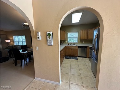 This 2nd-floor end-unit condo is shaded by mature trees and on Westminster Golf Club in Florida - for sale on GolfHomes.com, golf home, golf lot