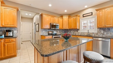 Carefree Lake Living Starts Here at Bello Point! Experience the on The Club At Porto Cima in Missouri - for sale on GolfHomes.com, golf home, golf lot