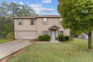 Welcome to this updated 1,480 square foot home in the wooded on Bella Vista - Metfield Golf Complex and Country Club in Arkansas - for sale on GolfHomes.com, golf home, golf lot