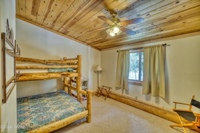 Custom FULL LOG cabin ON TWO LOTS . This Pinetop Lakes Country on Pinetop Lakes Golf and Country Club in Arizona - for sale on GolfHomes.com, golf home, golf lot