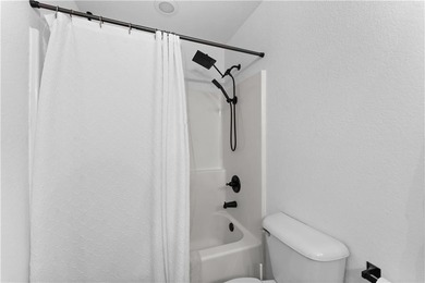 Welcome to this updated 1,480 square foot home in the wooded on Bella Vista - Metfield Golf Complex and Country Club in Arkansas - for sale on GolfHomes.com, golf home, golf lot