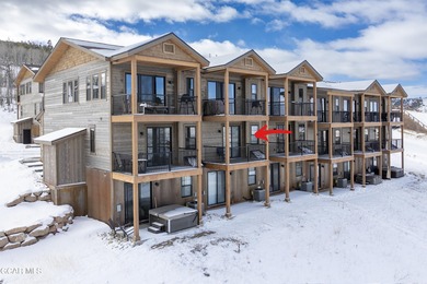 This luxurious townhome can be seen rising above the Granby on Headwaters Golf Course At Granby Ranch in Colorado - for sale on GolfHomes.com, golf home, golf lot