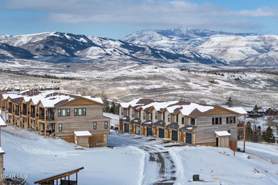 This luxurious townhome can be seen rising above the Granby on Headwaters Golf Course At Granby Ranch in Colorado - for sale on GolfHomes.com, golf home, golf lot