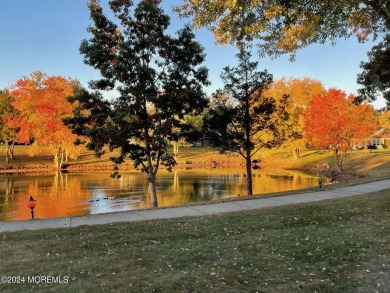 Nestled in the heart of Leisure Village, this updated home on Greenbriar Woodlands in New Jersey - for sale on GolfHomes.com, golf home, golf lot