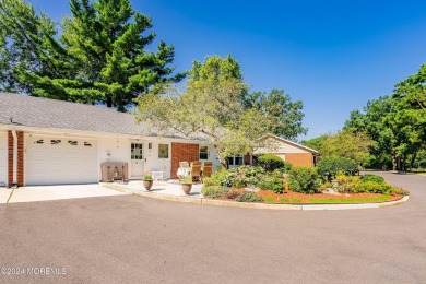 Nestled in the heart of Leisure Village, this updated home on Greenbriar Woodlands in New Jersey - for sale on GolfHomes.com, golf home, golf lot