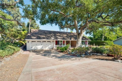 Tucked along the quiet greens of San Dimas Canyon Golf Course on San Dimas Canyon Golf Course in California - for sale on GolfHomes.com, golf home, golf lot