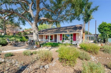 Tucked along the quiet greens of San Dimas Canyon Golf Course on San Dimas Canyon Golf Course in California - for sale on GolfHomes.com, golf home, golf lot