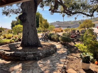 Tucked along the quiet greens of San Dimas Canyon Golf Course on San Dimas Canyon Golf Course in California - for sale on GolfHomes.com, golf home, golf lot