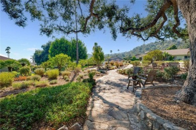 Tucked along the quiet greens of San Dimas Canyon Golf Course on San Dimas Canyon Golf Course in California - for sale on GolfHomes.com, golf home, golf lot