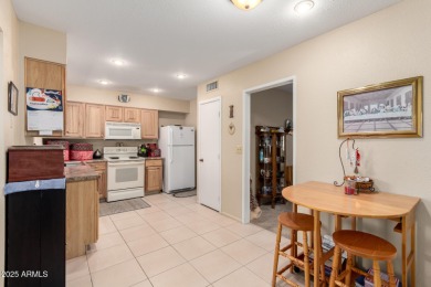 You don't want to miss this charming 2-bedroom townhome in the on Sun City Lakes West and East in Arizona - for sale on GolfHomes.com, golf home, golf lot